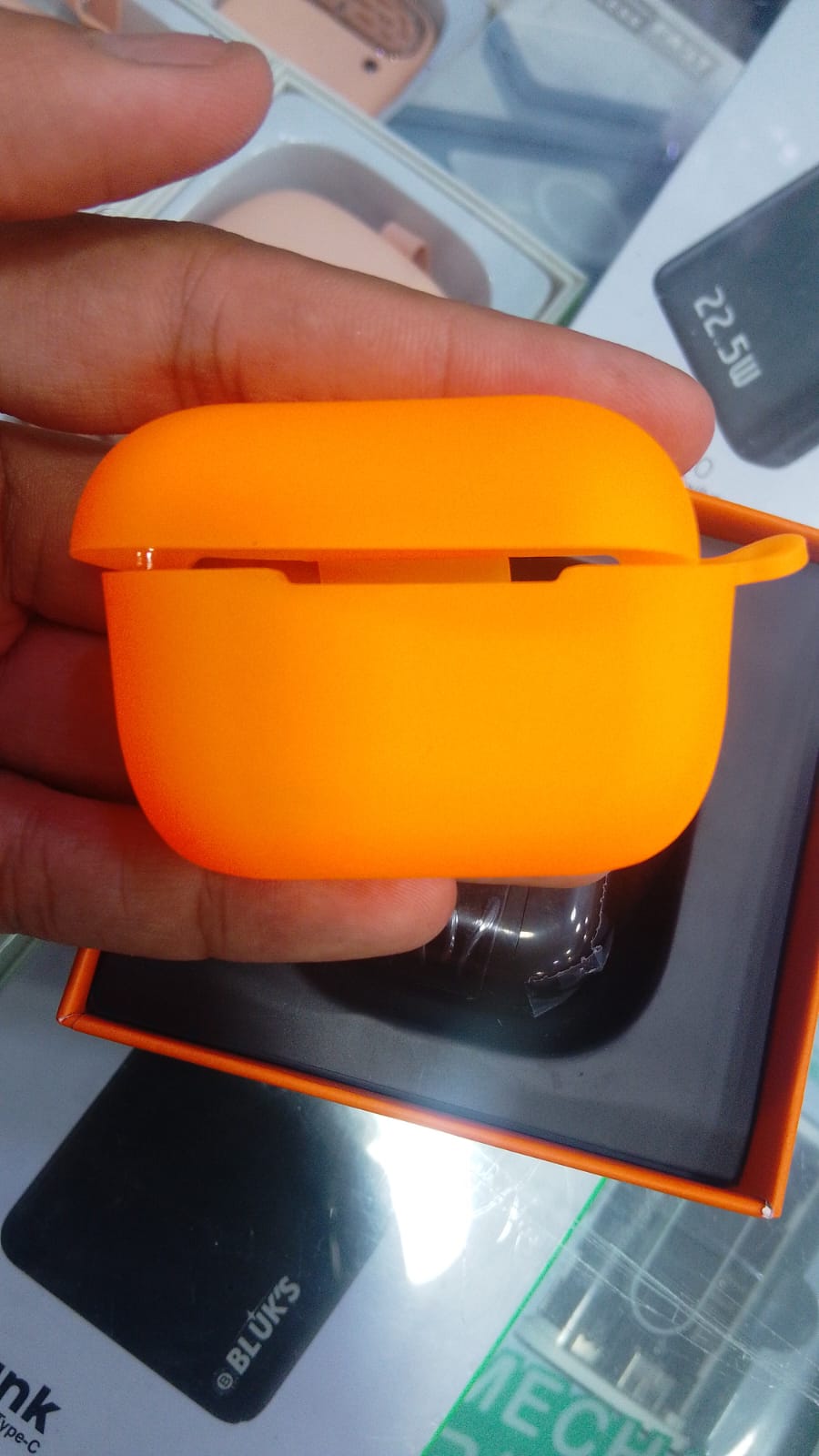 Pro 2 wireless Earbuds with orange protective silicone case